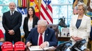President Donald Trump speaks to the media after signing executive orders relating to higher education institutions, alongside Secretary of Commerce Howard Lutnick, and Secretary of Education Linda McMahon, right, in the Oval Office of the White House on April 23/