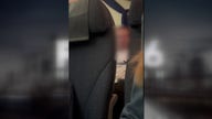Passenger experiencing medical crisis attempts to open plane door mid-flight to Houston