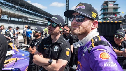 Juncos Hollinger Racing driver Conor Daly (76) stands next to his car Saturday, May 17, 2025, during qualifying for the 109th running of the Indianapolis 500 at Indianapolis Motor Speedway. - Fox Business News