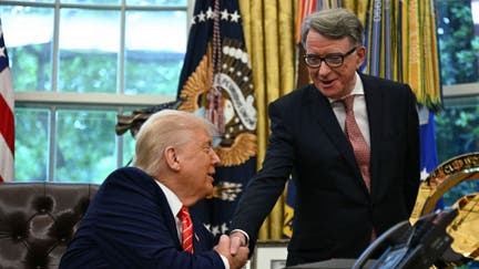 US President Donald Trump shakes hands with British ambassador to the United States Peter Mandelson after making a trade announcement in the Oval Office of the White House in Washington, DC, on May 8, 2025. US President Donald Trump on Thursday announced a "full and comprehensive" trade agreement with Britain, which would be the first such deal since he launched his global tariffs blitz.