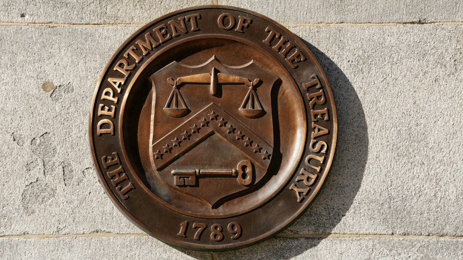 FILE PHOTO: A bronze seal for the Department of the Treasury is shown at the U.S. Treasury building in Washington, on Jan. 20, 2023.