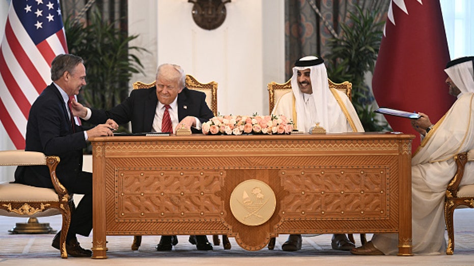 Ortberg, President Donald Trump and Qatar's Emir Sheikh Tamim bin Hamad al-Thani
