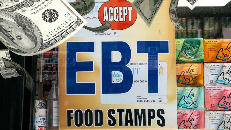 Food stamp and EBT sign with dollar bills