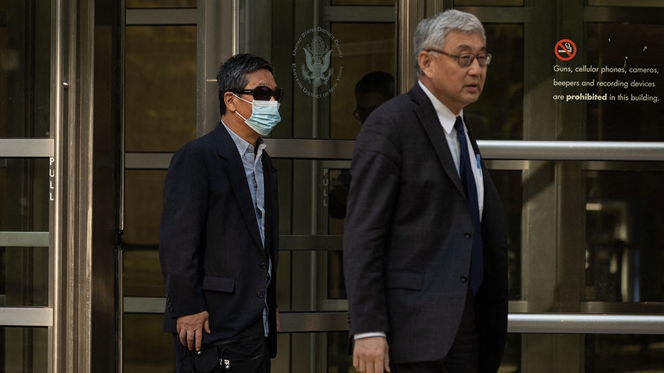Yong Zhu leaves Federal Court in New York City