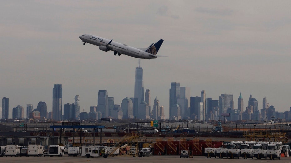 A plane against the Newark horizon