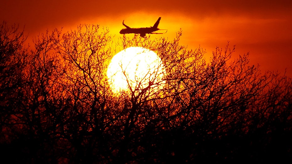 A plane against the Newark horizon