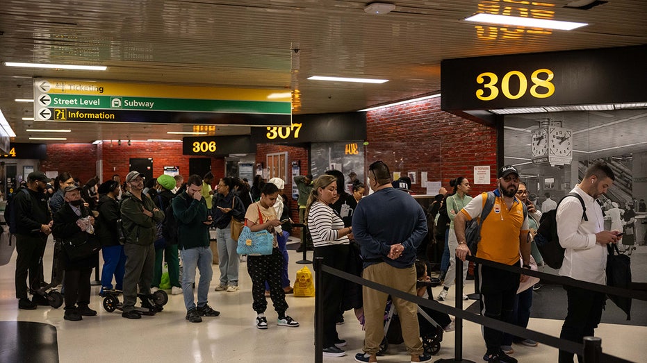 People waiting for buses amid rail strike