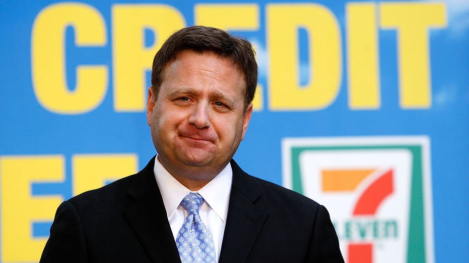 WASHINGTON - SEPTEMBER 30: CEO of 7-Eleven Joe DePinto pauses during a news conference on Capitol Hill September 30, 2009 in Washington, DC. More than 1.66 million of customer signatures, which were collected by 7-Eleven store franchisees all around the country, were delivered to members of Congress to call on the passing of legislation that prohibits credit card networks and card-issuing banks from charging