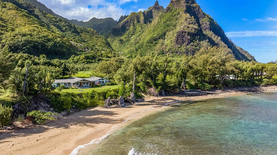 The home boasts direct access to the beachfront.