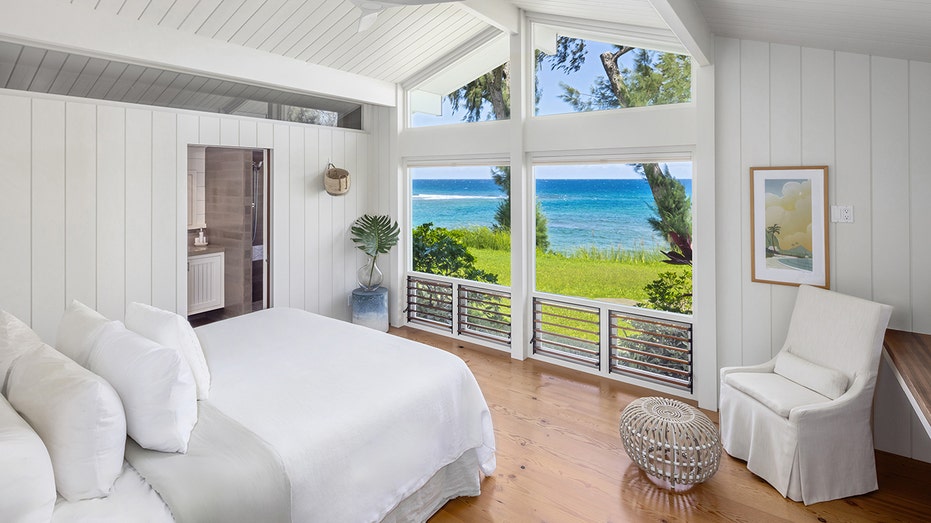 The guest bedroom also boasts picturesque ocean views.