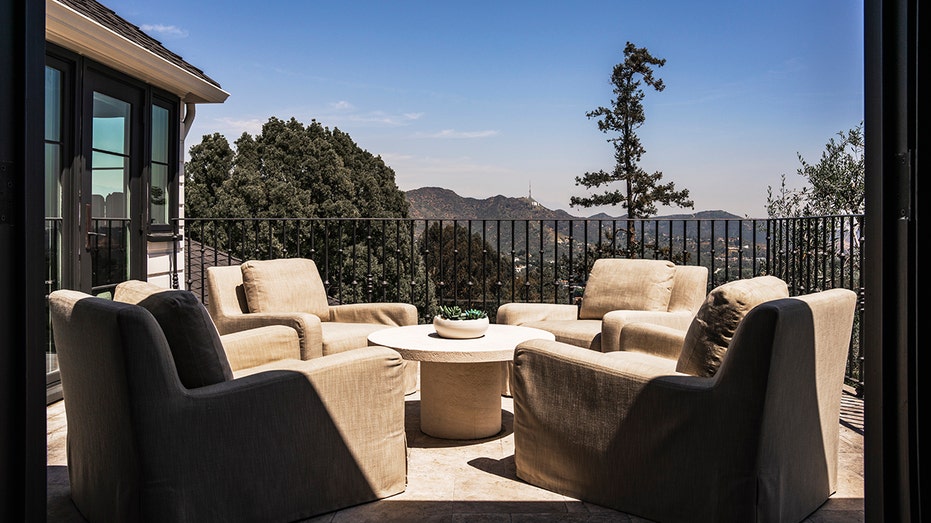 The outdoor terrace has views of the Griffith Observatory in the distance.