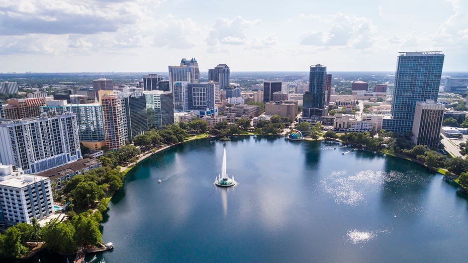 Florida, Orlando, Lake Eola Park and skyline. (Photo by: Jeffrey Greenberg/Education Images/Universal Images Group via Getty Images)