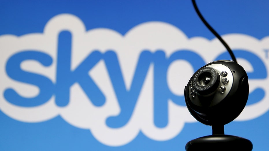 Web camera with Skype logo in the background