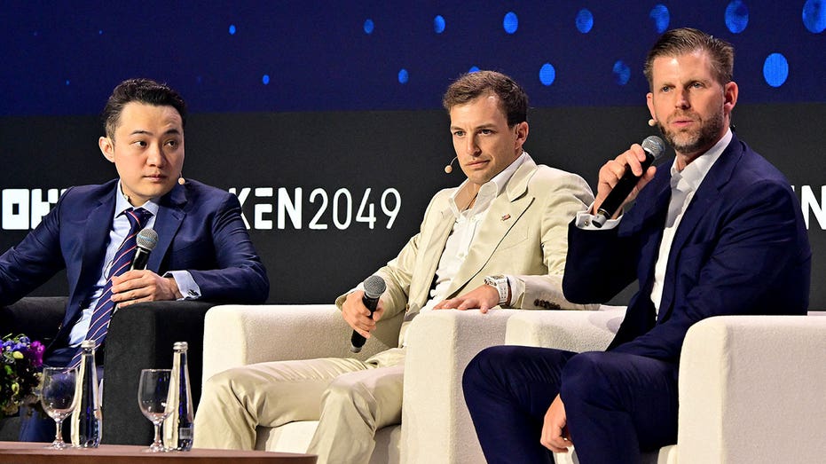 The Trump Organisation executive vice-president Eric Trump (R), World Liberty Financial co-founder Zach Witkoff (C) and cryptomoney exchange Tron Justin Sun (L), participate in a session during the Token 2049 crypto conference in Dubai on May 1, 2025. (Photo by Giuseppe CACACE / AFP) (Photo by GIUSEPPE CACACE/AFP via Getty Images)