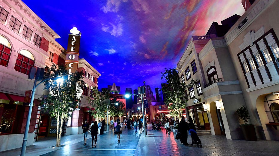 People walk around at Warner Bros. World, the first-ever Warner branded indoor theme park, in the UAE capital Abu Dhabi on July 27, 2018. - The park officially opened to the public on July 25 after two years of construction. (Photo by GIUSEPPE CACACE / AFP) (Photo credit should read GIUSEPPE CACACE/AFP via Getty Images)