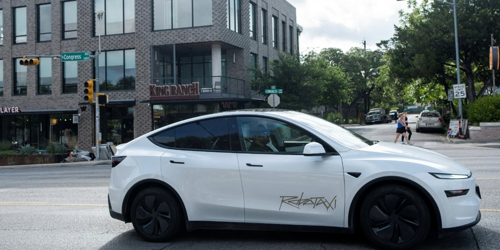 https://a57.foxnews.com/static.foxbusiness.com/foxbusiness.com/content/uploads/2025/06/1024/512/tesla-robotaxi-austin-texas-driving-reuters.jpg?ve=1&tl=1