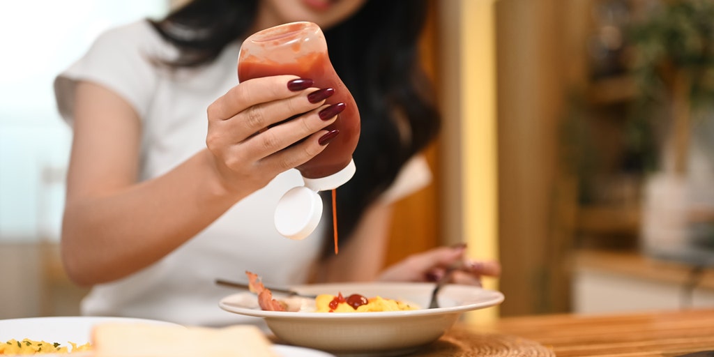https://a57.foxnews.com/static.foxbusiness.com/foxbusiness.com/content/uploads/2025/06/1024/512/woman-squeezes-ketchup-bottle-onto-breakfast.jpg?ve=1&tl=1