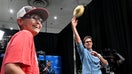 Axton Robertson and Tom Brady play catch during Fanatics Fest NYC 2025 at Javits Center on June 20, 2025 in New York City.   - Fox Business News