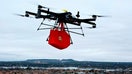 A shot of the Flytrex drone delivering a DoorDash order, - Fox Business News