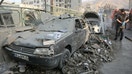 People gather near damaged vehicles in the aftermath of Israeli strikes, in Tehran, Iran, on June 13, 2025. - Fox Business News