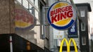 Illuminated logos sit above fast food restaurants operated by Burger King Worldwide Inc. and McDonald's Corp. in Mannheim, Germany, on Tuesday, Jan. 20, 2015. German investor confidence jumped to the highest level in 11 months in January as the European Central Bank prepares for quantitative easing. Photographer: Krisztian Bocsi/Bloomberg via Getty Images
 - Fox Business News