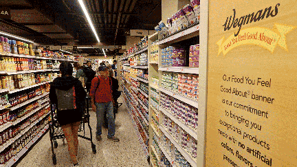 NEW YORK, NY - OCTOBER 28: People shop at the new Wegmans Astor Place grocery store on October 28, 2023, in New York City. (Photo by Gary Hershorn/Getty Images)
 - Fox Business News