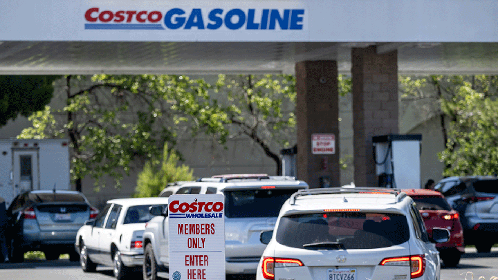 Vehicles in line at a Costco gas station