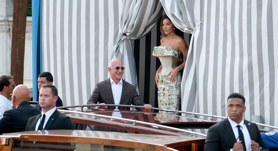 VENICE, ITALY - JUNE 26: Jeff Bezos and Lauren Sanchez are seen leaving the Aman Hotel in Venice ahead of Jeff Bezos and Lauren Sanchez Wedding on June 26, 2025 in Venice, Italy. (Photo by Stefano Mazzola/GC Images)
