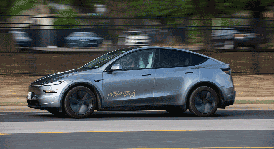 A vehicle Tesla is using for robotaxi testing purposes on Oltorf Street in Austin, Texas, US, on Sunday, June 22, 2025. The launch of Tesla Inc.'s driverless taxi service Sunday is set to begin modestly, with a handful of vehicles in limited areas of the city. Photographer: Tim Goessman/Bloomberg via Getty Images
