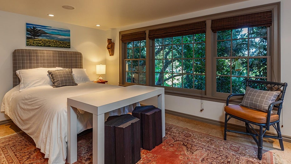 Another guest bedroom can be found on the lower level of the home.