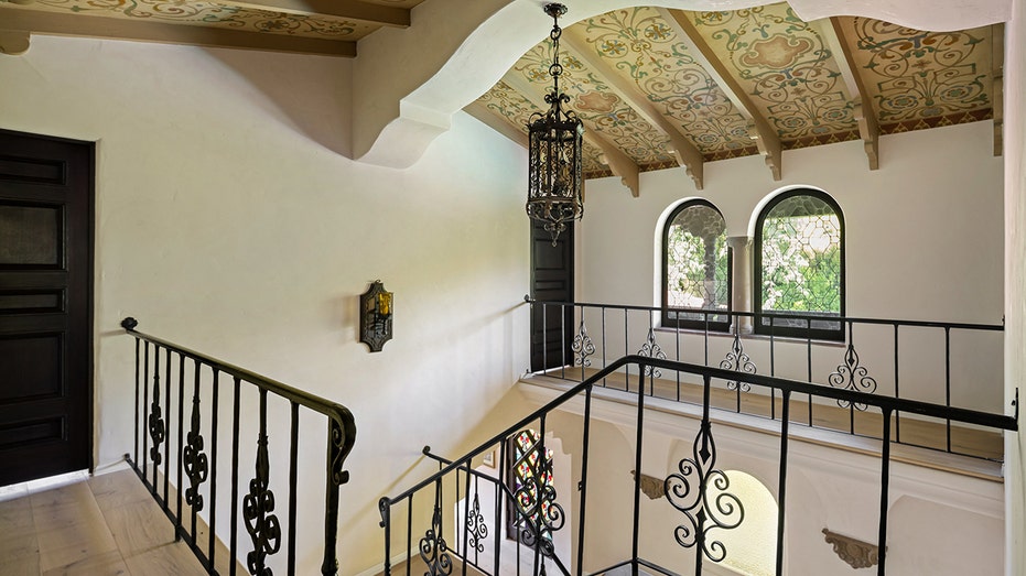 While updated the home maintains its original charm including stain glass windows and hand-painted ceilings.