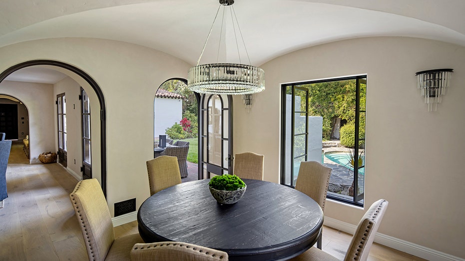 The dining room features access to the backyard.