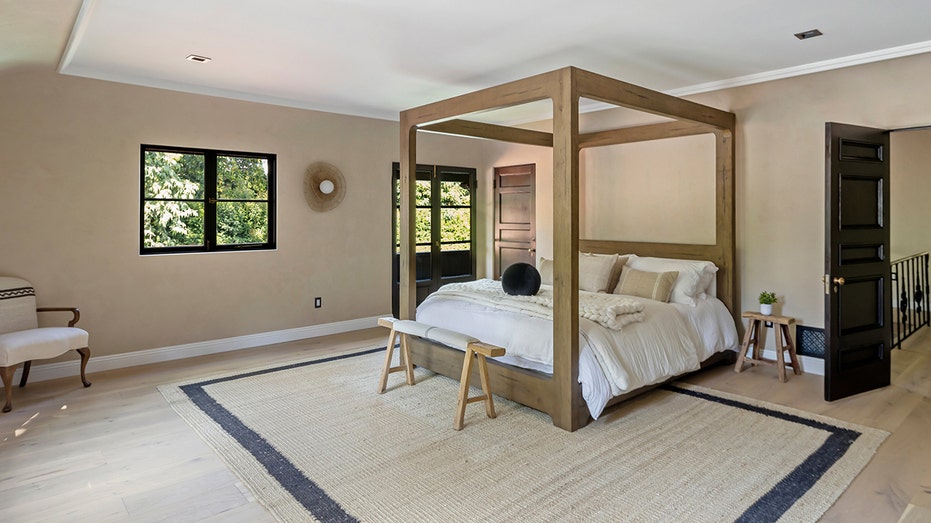 The ensuite bedroom has access to a terrace and a walk-in closet.