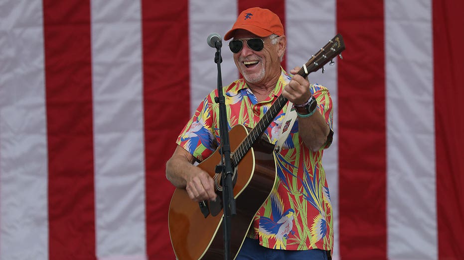WEST PALM BEACH, FLORIDA - NOVEMBER 03: Jimmy Buffett plays a song as he performs at a Get Out the Vote rally for U.S. Senator Bill Nelson (D-FL) and Florida Democratic governor candidate Andrew Gillum at the Meyer Amphitheatre on November 03, 2018 in West Palm Beach, Florida. Mr. Buffett was encouraging people to vote for Sen. Nelson and Mayor Gillum who are in tight races against their Republican opponents. (Photo by Joe Raedle/Getty Images)