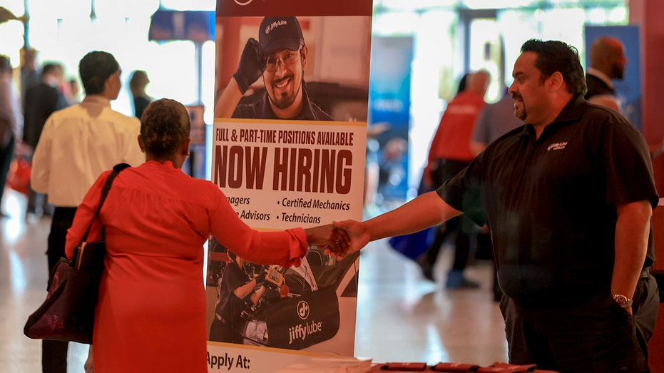 Jiffy Lube hiring booth at job fair