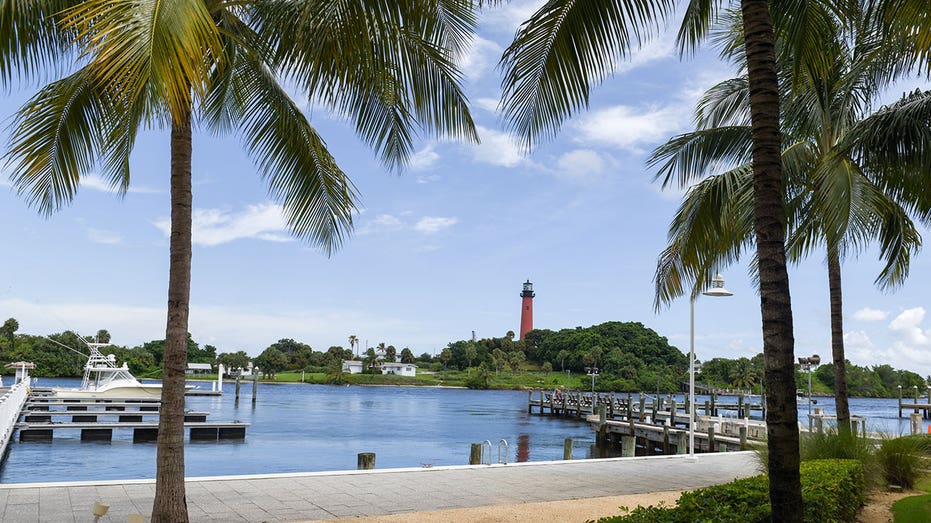 On Friday, August 30, 2019, a boat sits next to a ski slip at Jupiter's Inlet Marina in front of Hurricane Dorian in Jupiter, Florida. Hurricane Dorian could reach major hurricane status towards Florida, stopping near the coast, leading to an extended period of wind, rain and rainy sarge. Photographer: Christina Mendenhall/Bloomberg via Getty Images