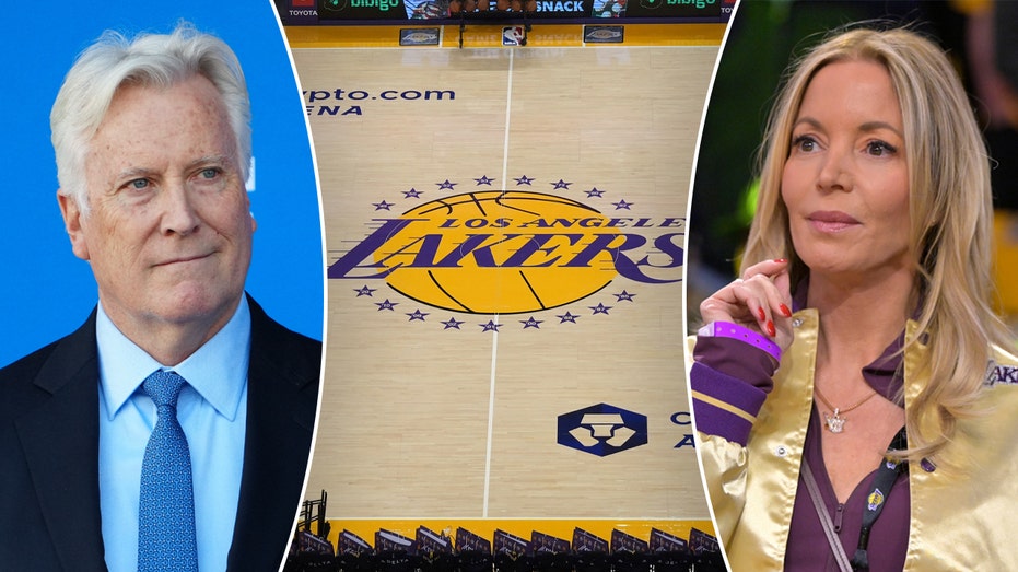 Mark Walter and Jenny Boss with the Lakers Court's slogan in the center