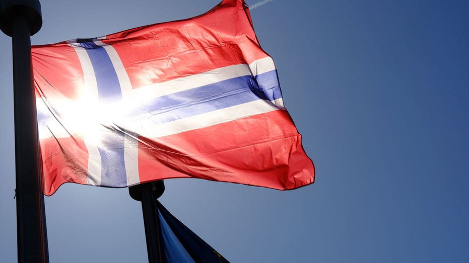 BRUSSELS, BELGIUM - APRIL 7 : The Flag of Norway and the EU are seen in front of the Berlaymont, the EU Commission headquarters on April 7, 2025 in Brussels, Belgium. Prime Minister of Norway Jonas Gahr Støre is in Brussels, the EU Capital to find solutions after the latest developments in the USA trade tariff policies. (Photo by Thierry Monasse/Getty Images)