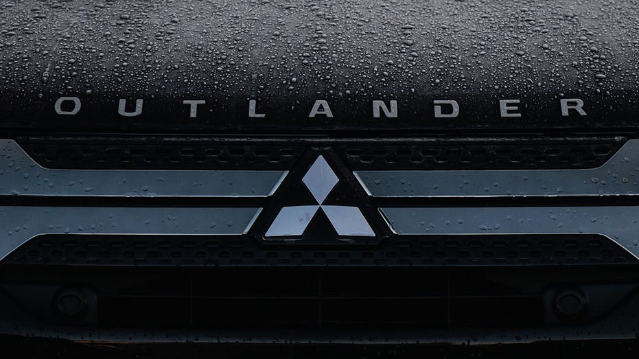 A Mitsubishi logo seen on a parked Mitsubishi Outlander car in Dublin city center. On Monday, January 25, 2021, in Dublin, Ireland. (Photo by Artur Widak/NurPhoto via Getty Images)