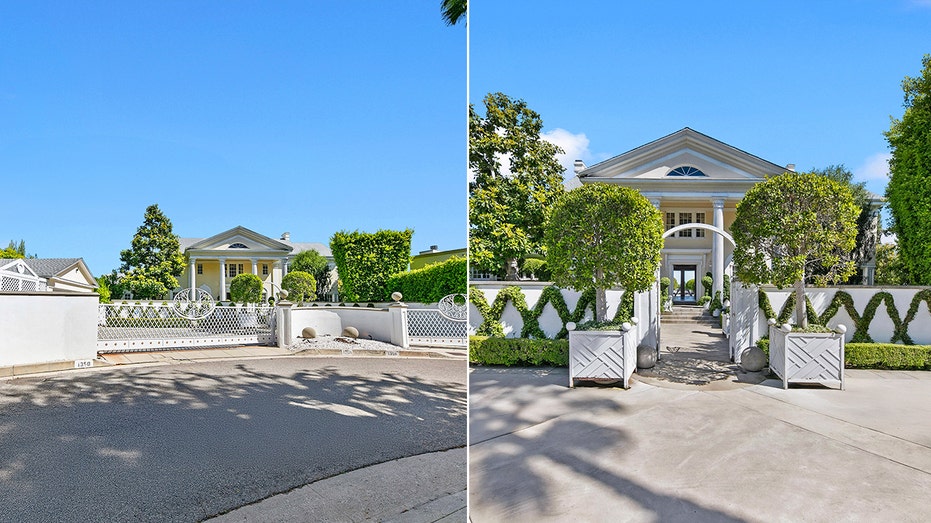 The home can be found behind a white gate, which also leads to the motorcourt.