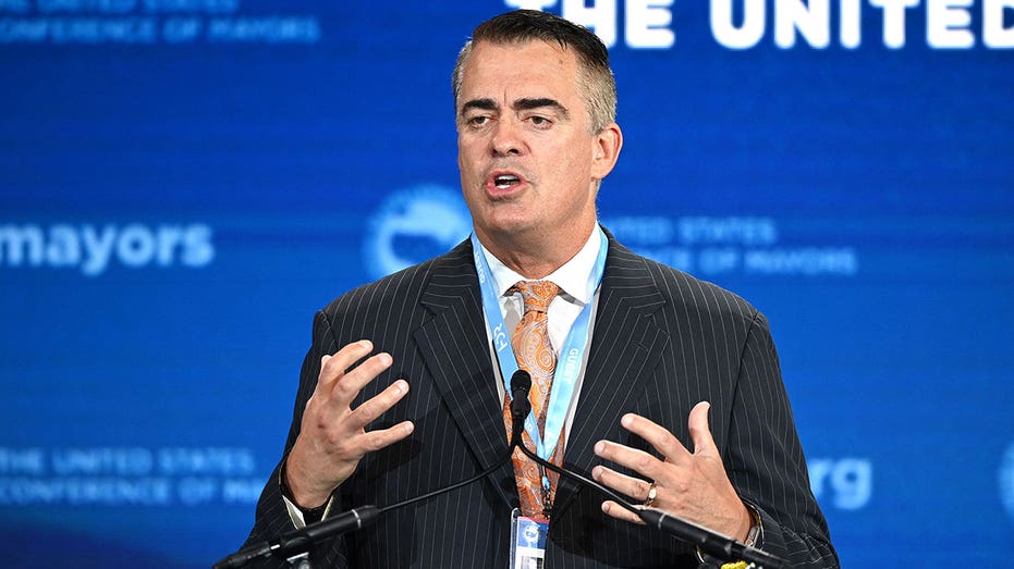 Axon Enterprises CEO and founder Rick Smith speaks during the US Conference of Mayors 91st Winter Meeting at the Capital Hilton in Washington, DC, on January 18, 2023. (Photo by Mandel NGAN / AFP) (Photo by MANDEL NGAN/AFP via Getty Images)