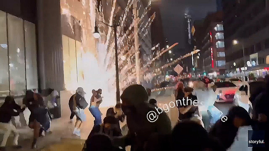 fireworks went off as looters run through streets of LA