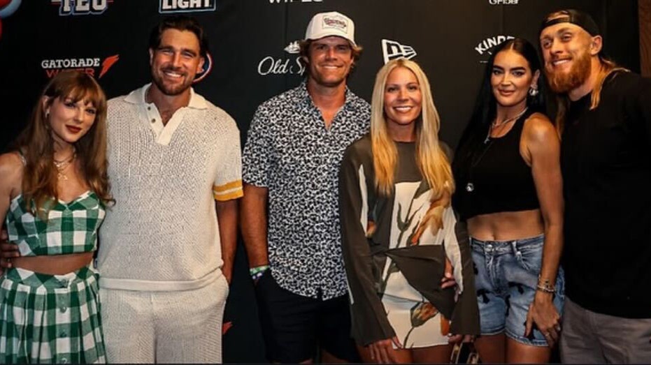 Taylor Swift, Travis Kelce, Greg and Kara Olsen, Claire and George Kittle smile