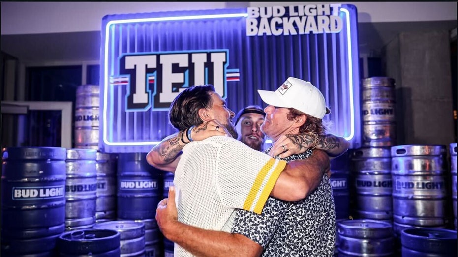 Travis Kelce, George Kittle, Greg Olsen Group Hug