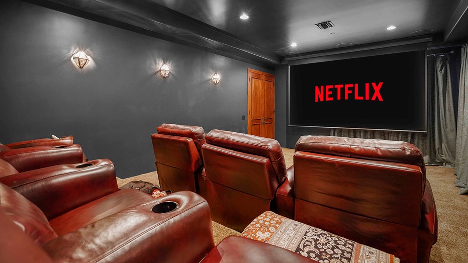 The home also boasts an at-home theater with tiered seating.