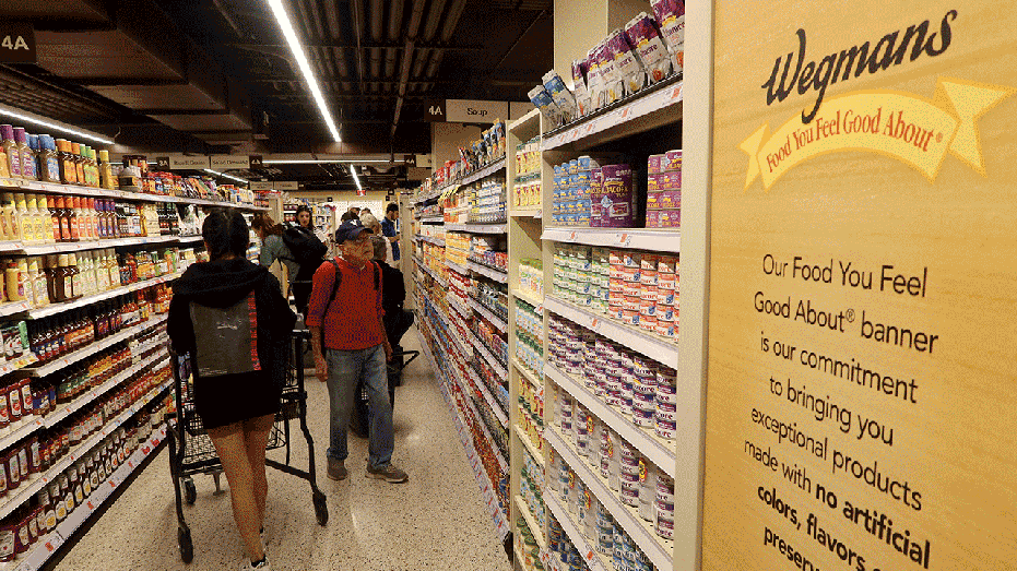 New York, New York - October 28: People are shopping at the Weyjanz Astor Place of groceries on October 28, 2023, in New York City. (Photo by Gary Hershorn/Getty Emiez)