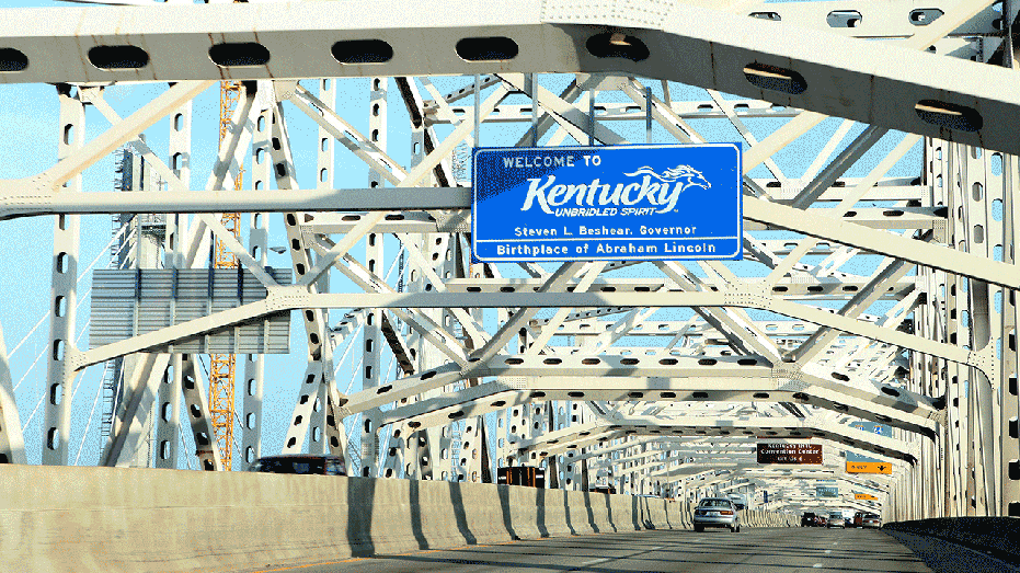 CLARKSVILLE, IN - JULY 16: 'Welcome To Kentucky' signage as photographed on the George Rogers Clark Memorial Bridge on July 16, 2015 in Clarksville, Indiana. (Photo By Raymond Boyd/Getty Images)