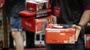 An employee holds boxes of Nintendo Switch 2 game consoles at a Game store in Madrid, Spain, in the early hours on Thursday, June 5, 2025. Nintendo is opening sales of the Switch 2 today, and shoppers are scouting out stores to increase their chances of getting a hold of the $450 console. Photographer: Claudia Paparelli/Bloomberg via Getty Images - Fox Business News
