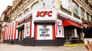 Signage at a KFC with the Colonel looking 'serious' - Fox Business News