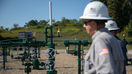 Diversified Energy employees stand by natural gas well in Franklin Township, Washington County, Pennsylvania, on September 6, 2024. Once a Democratic stronghold with a strong union presence, Washington County has voted Republican in every presidential election since 2008.  - Fox Business News